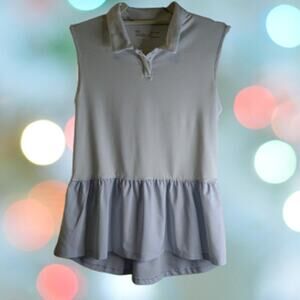 Under Armour small petite sleeveless light blue heatgear woman's top.